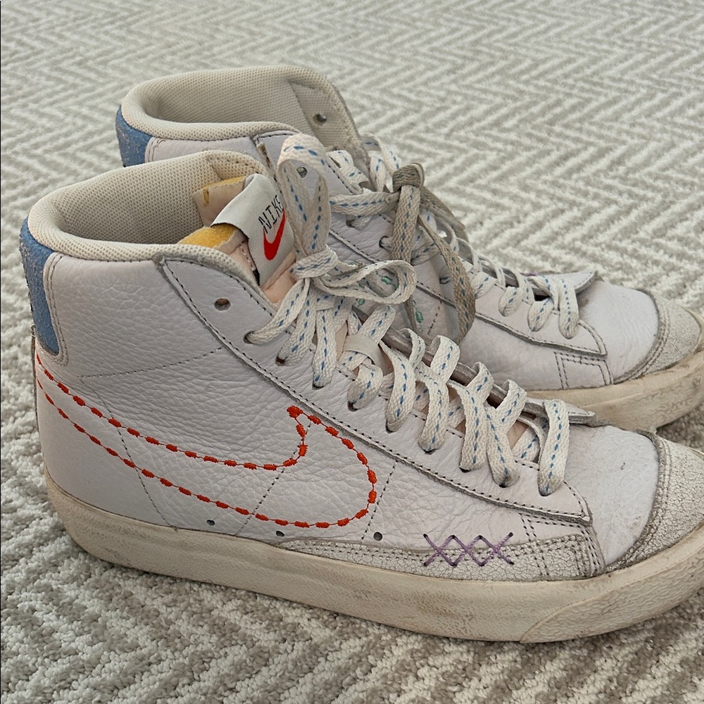 Nike White and Orange High-Tops with Blue Accents